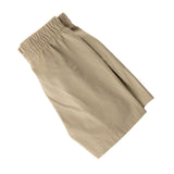 Khaki shorts folded to display the materials 