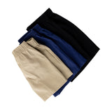Side angle of the shorts in a pile. The shorts are khaki, blue, and black