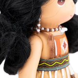 Side angle of The Doll Maker Maori Dancer Doll 