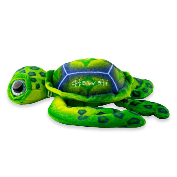 Plush green sea turtle with big eyes that says Hawaii on the side of the shield