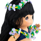 Close up of the hula dancer doll's face