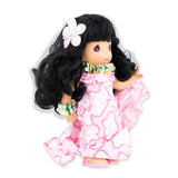 Side view angle of the doll showing the dress and the pattern of the dress
