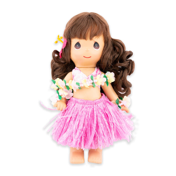Hula dancer doll with pink skirt and wearing floral leis
