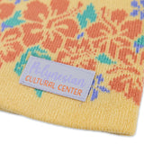 Close up of Polynesian Cultural Center Yellow "Plumeria" Knitted Beanie Cap
