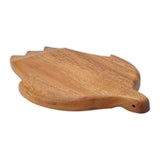 Wooden cutting board into the shape of a turtle