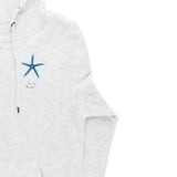 Close up of the hoodie showing the blue starfish