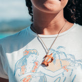 Model wearing Koa Honu (Sea Turtle) with Mother of PearI Inlay Necklace