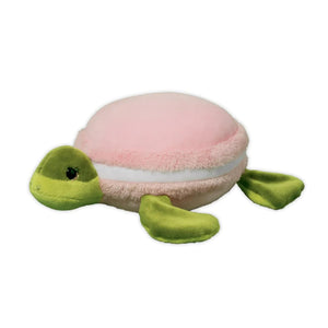 Plushie of a sea turtle with a macron for its body/shell