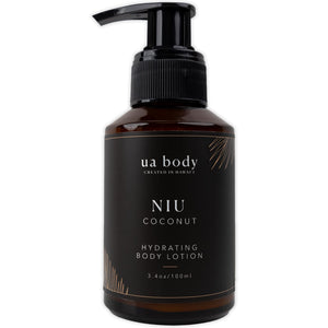 Niu Coconut Lotion in a brown bottle with pump to dispense it at the top