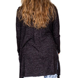 Model showing the back of Women's Black Heather Cardigan with PCC Logo