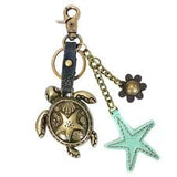 Chala Antique Bronze Sea Turtle Keychain with Starfish and Flower Charms.