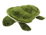 plushie in the shape of a turtle. The turtle is dark green and made from soft materials