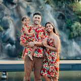 Women's Hawaiian Pineapple and Hibiscus Makaha Red Dress shown with matching men's shirts and child's dress.