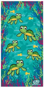 Beach towel with cartoon turtles and other ocean life details all over it