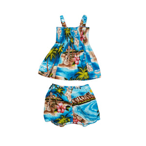 Infant dress with an included bottom piece, both with island themes and ocean backgrounds as well as labels for the islands of Hawai'i