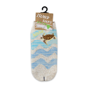Socks with turtle swimming on them