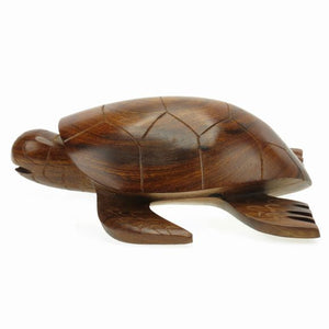 Block of wood carved in the shape of a sea turtle'