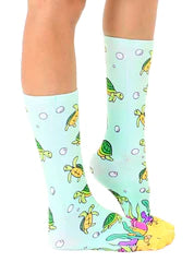 Socks with cartoon sea turtles on them